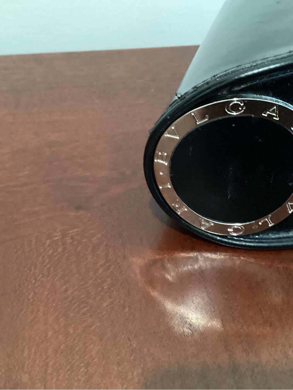 Bulgari Black Case with Gold-Tone Logo Ring and Sunglasses .